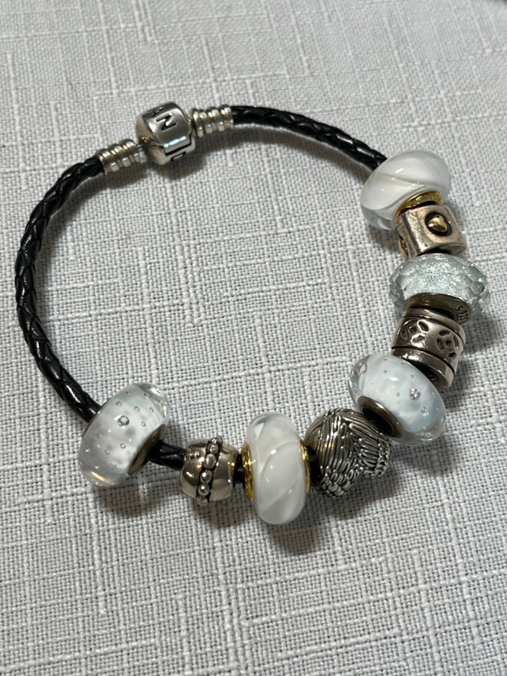Pandora Black Leather Bracelet with 9 Accent Charms (7 Pandora Beads)
7.25”